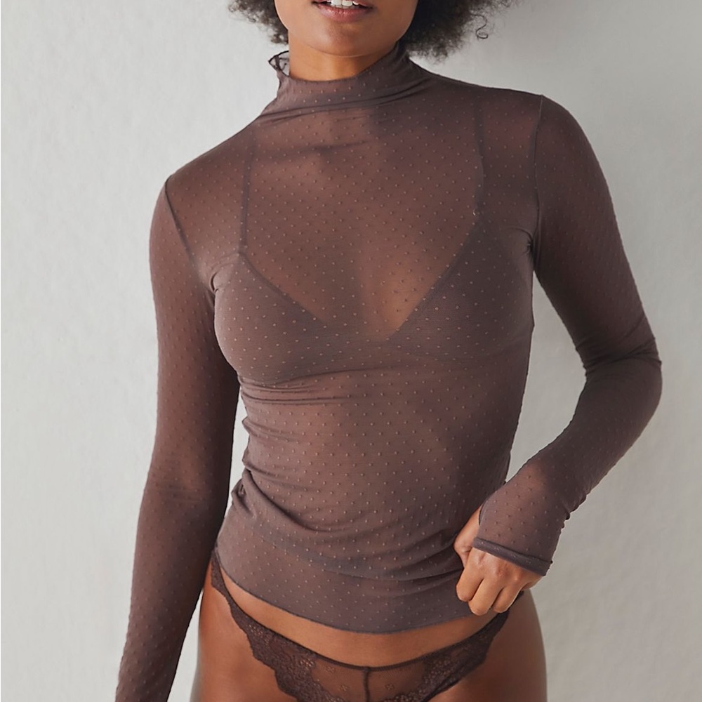 Free People on the dot top in black.